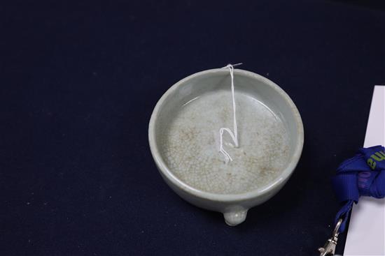 A Chinese celadon crackle glaze tripod censer, Yongzheng mark, late 19th/early 20th century, D. 11.3cm